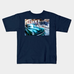 Old green American car on the streets of Havana Cuba Kids T-Shirt